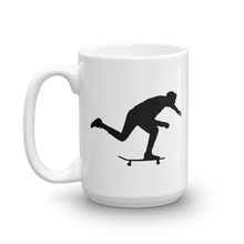 15 ounce white porcelain coffee or tea mug with silouehette of skateboarder pushing on their skateboard