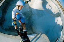 Image of Chris Miller skateboarding on lip of Del Mar Skate Ranch Pool with shadows below of skater and photographer